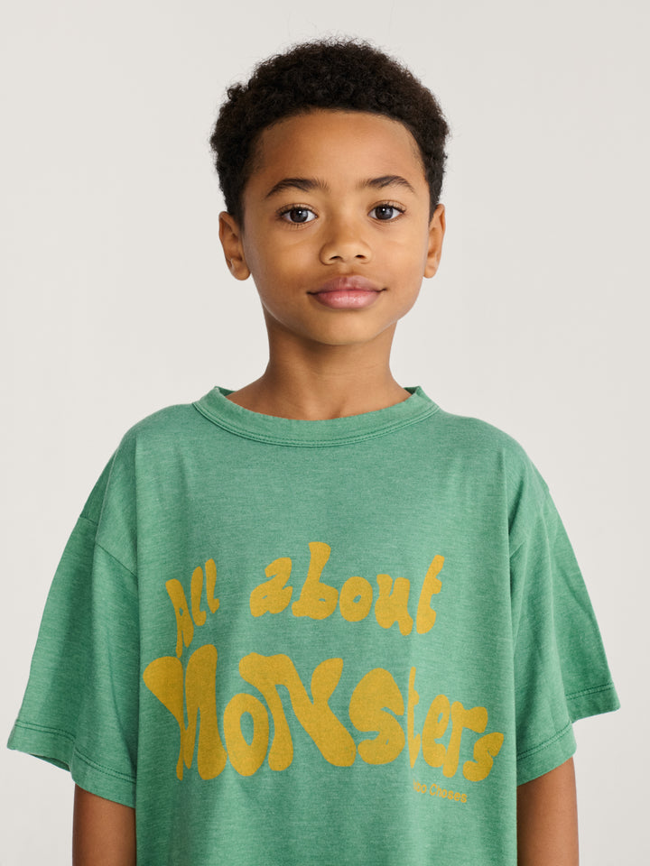 Garçon avec T-shirt Bobo Choses en coton vert avec imprimé All about monsters