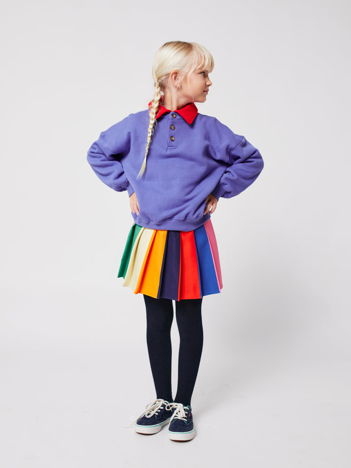 Fille avec Jupe Bobo Choses plissée rose, vert, jaune, bleu, rouge