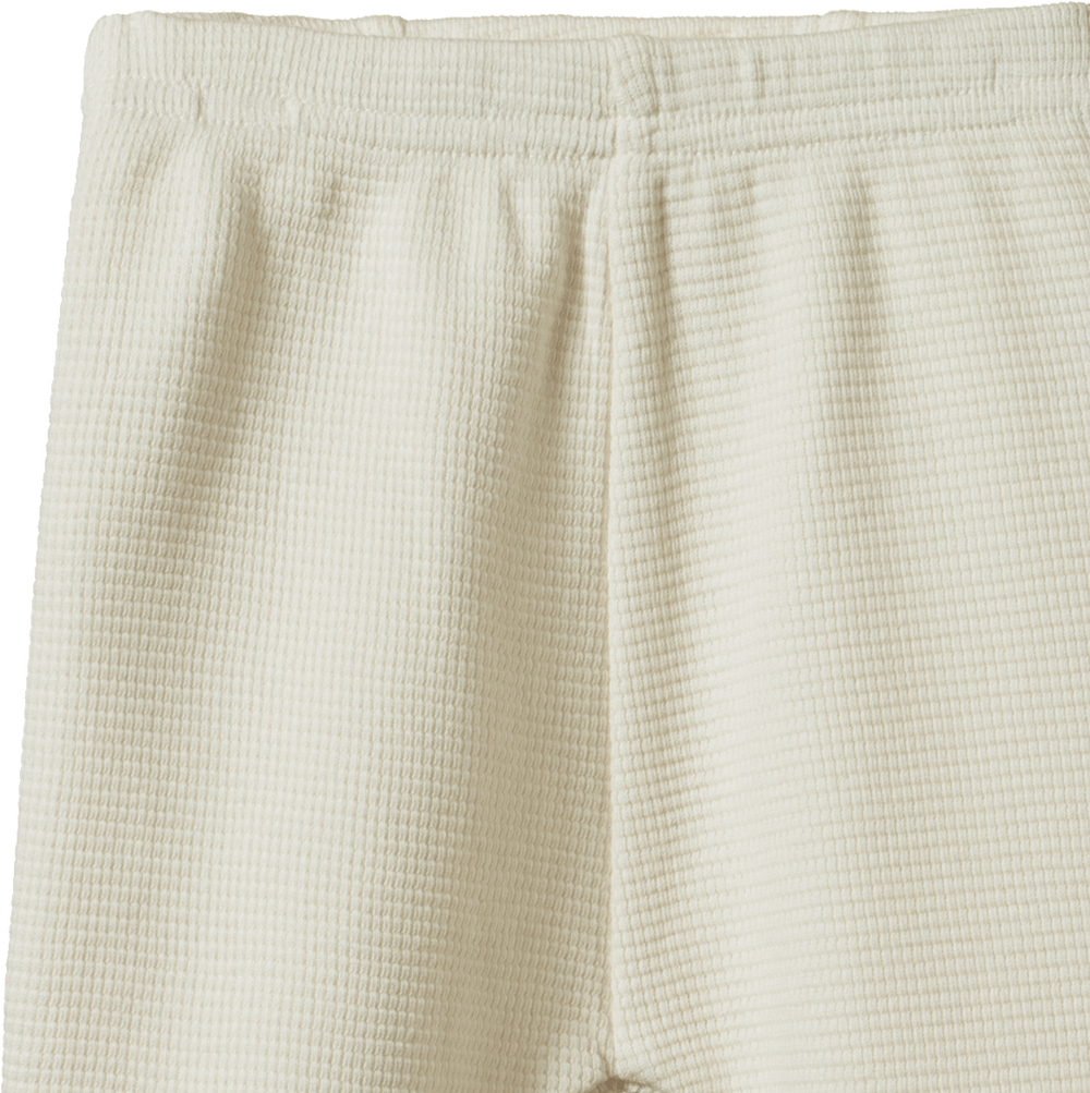 Détail de Pantalon pour bébé en coton gaufré naturel