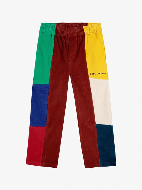 Pantalon droit en velours côtelé avec des taches de couleur jaune, vert, bleu, rouge, blanc