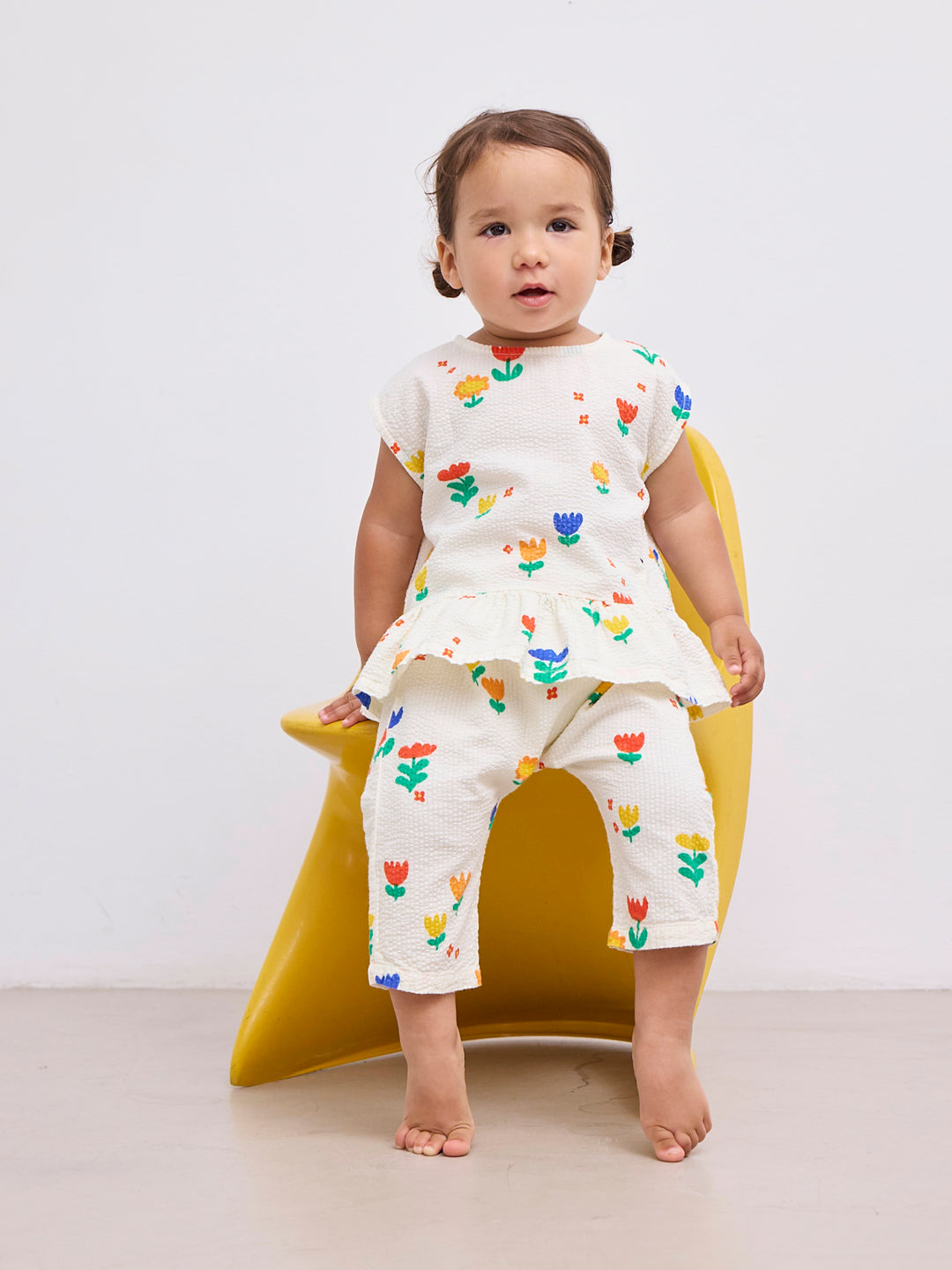 Fille avec Pantalon pour bébé en coton écru avec imprimé fleurs 