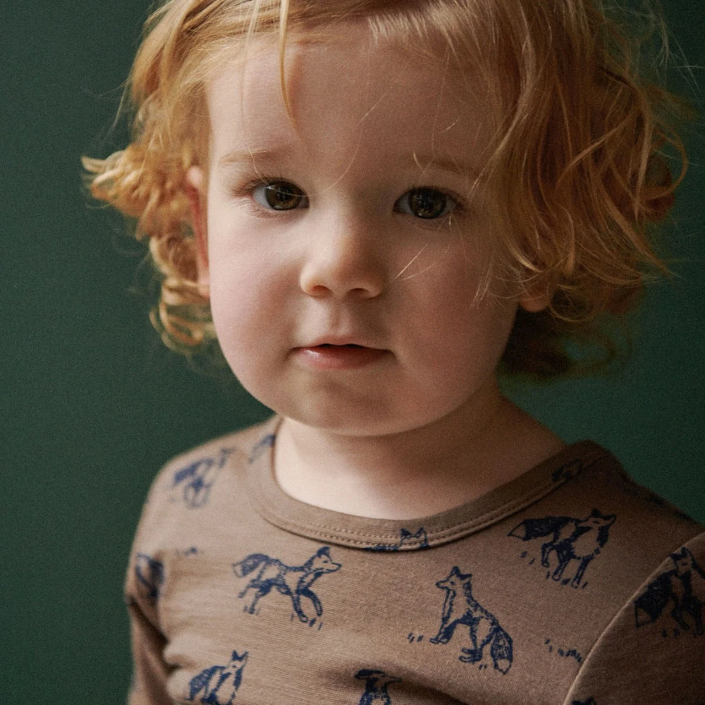 Enfant avec Pyjama manches longues en mérinos brun avec imprimé renards