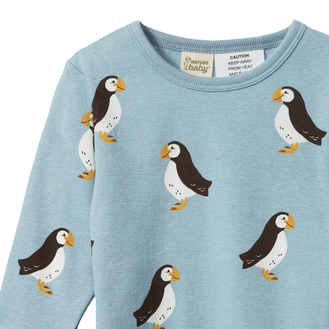 Pyjama manches longues en coton bleu avec imprimé macareux