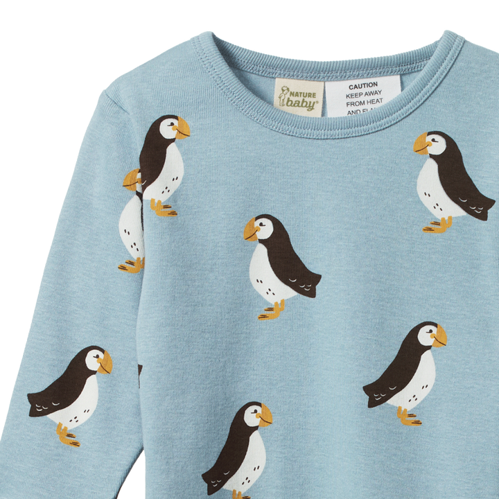 Pyjama manches longues en coton bleu avec imprimé macareux