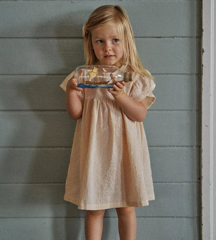 Fille avec Robe Nature Baby en coton rayé jaune
