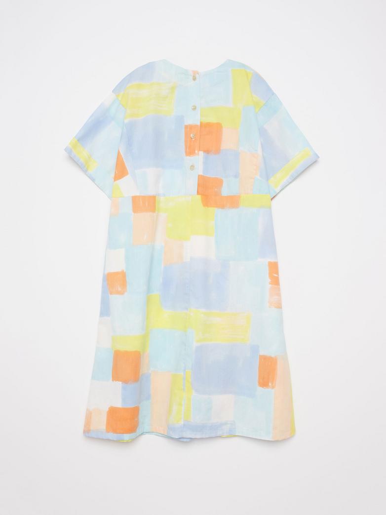 Dos de Robe True Artist avec tissu coloré orange, jaune, bleu et blanc