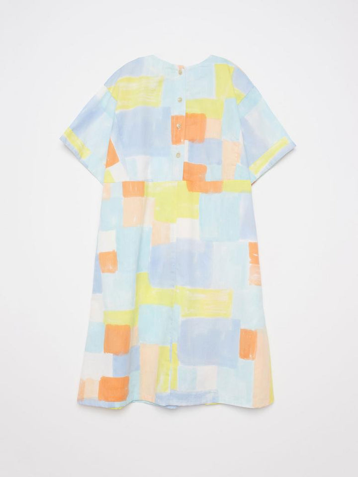 Dos de Robe True Artist avec tissu coloré orange, jaune, bleu et blanc