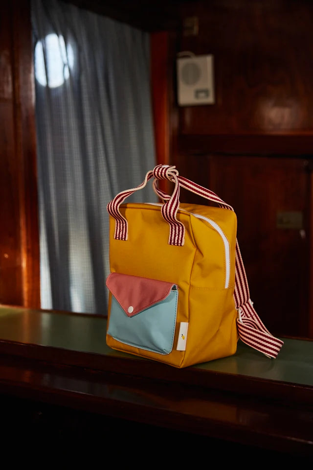 Petit Sac à dos Sticky Lemon jaune, bleu et rose