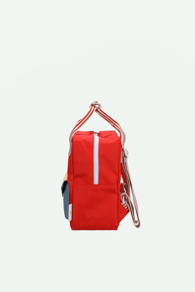 Côté de Petit sac à dos Sticky Lemon rouge, bleu et beige