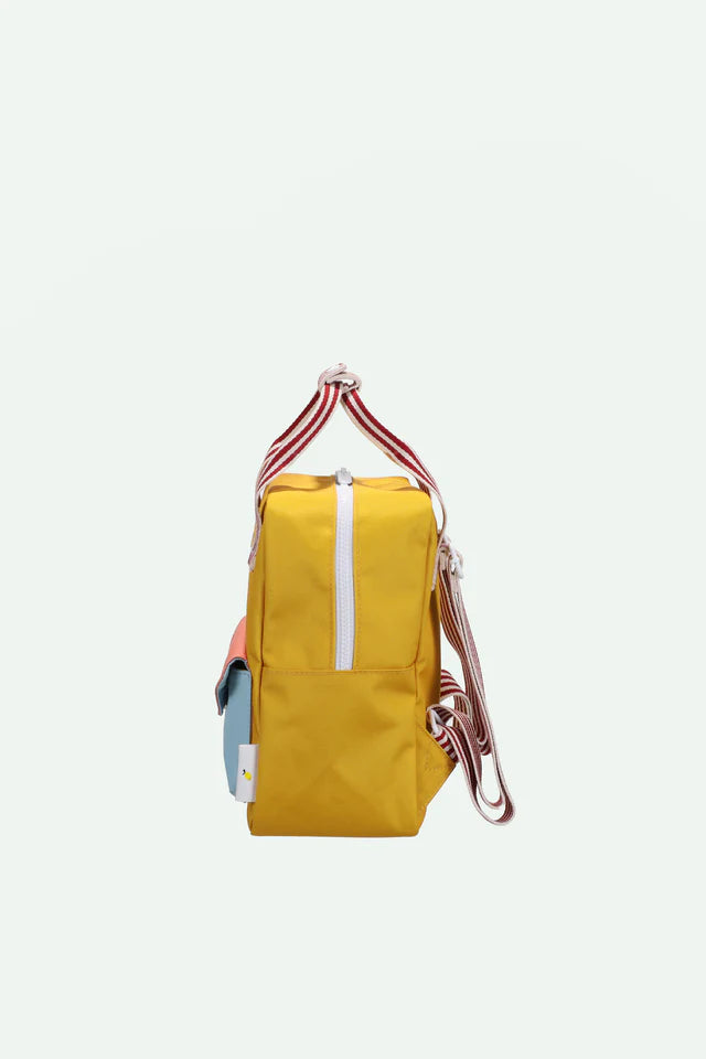 Côté de Petit Sac à dos Sticky Lemon jaune, bleu et rose