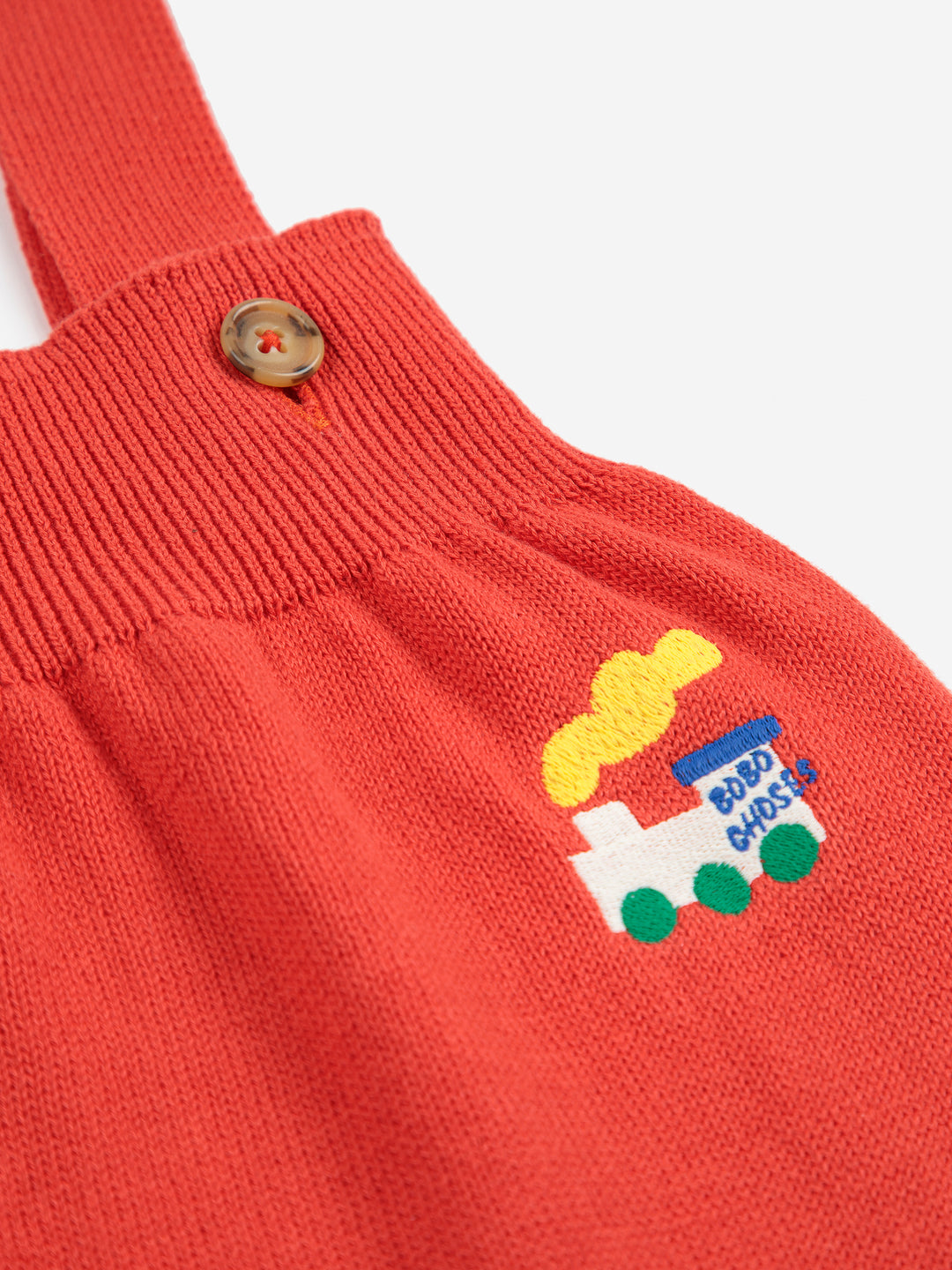 Détail de Salopette Bobo Choses tricotée en coton orange 