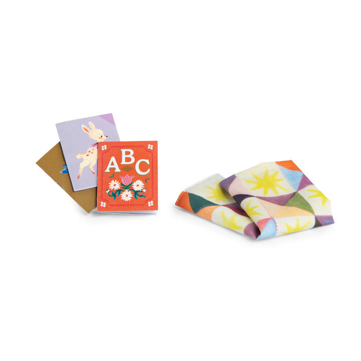 Livres et couverture du Set d'accessoires Le coin des histoires de Moulin Roty