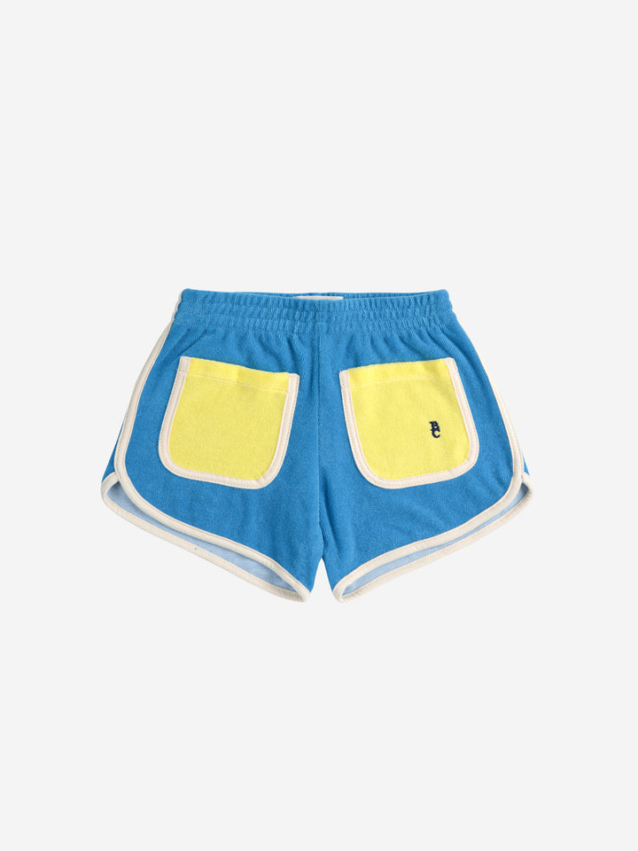 Short en ratine bleu avec pochettes jaunes