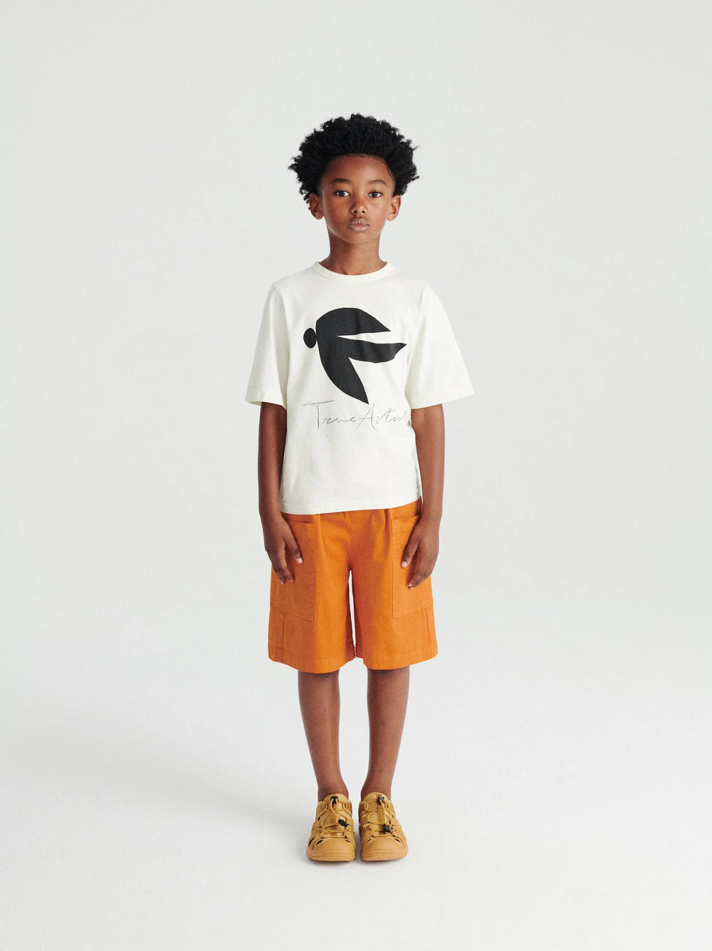 Garçon avec Shorts pour enfant True Artist en coton orange avec poches