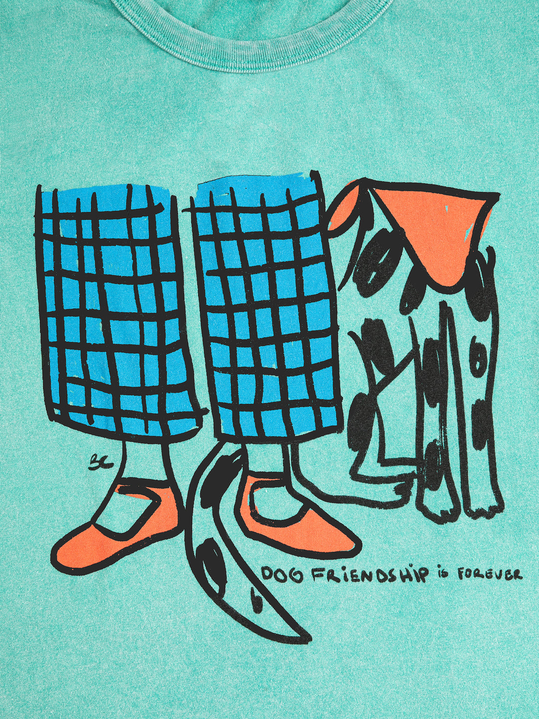 Détail de t-shirt Bobo Choses en coton vert avec imprimé chien et jambes d'enfant