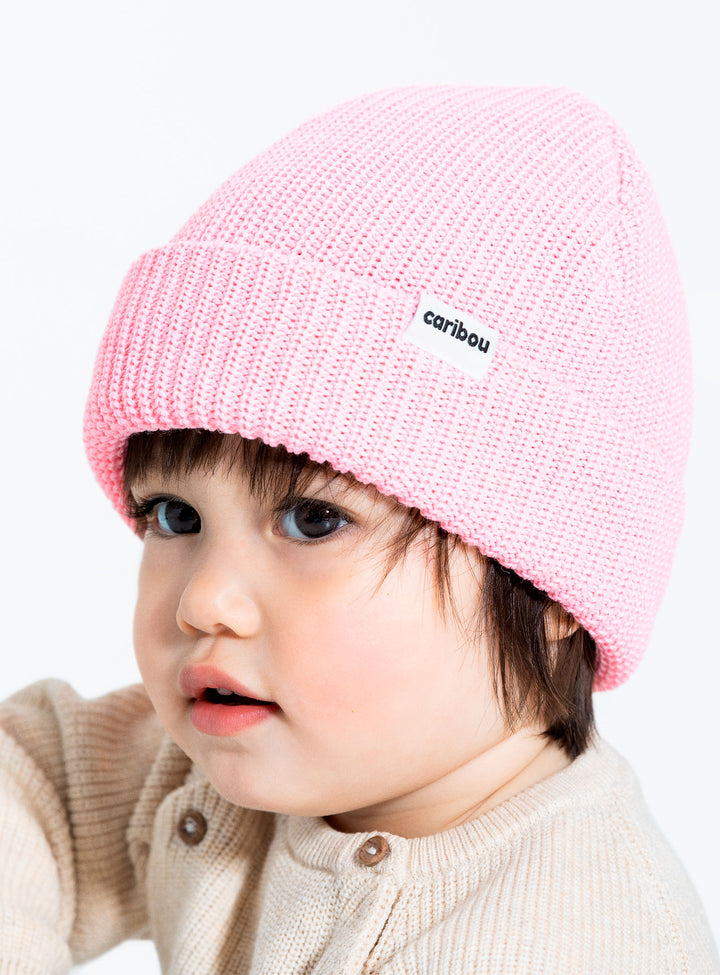 Bébé avec Tuque pêcheur tricoté en laine mérinos Rose