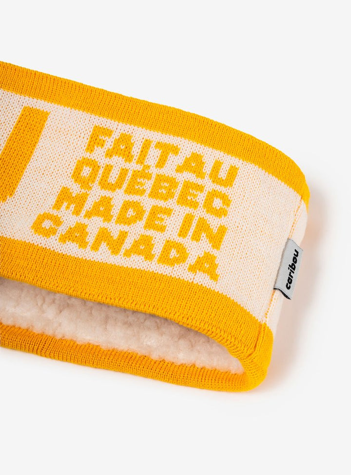 Bandeau en laine jaune avec logo Caribou