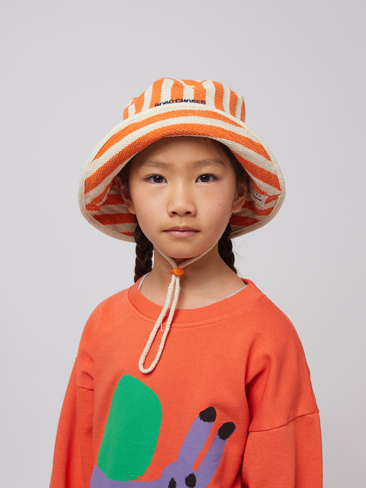 Fille avec Chapeau pêcheur en coton blanc et orange