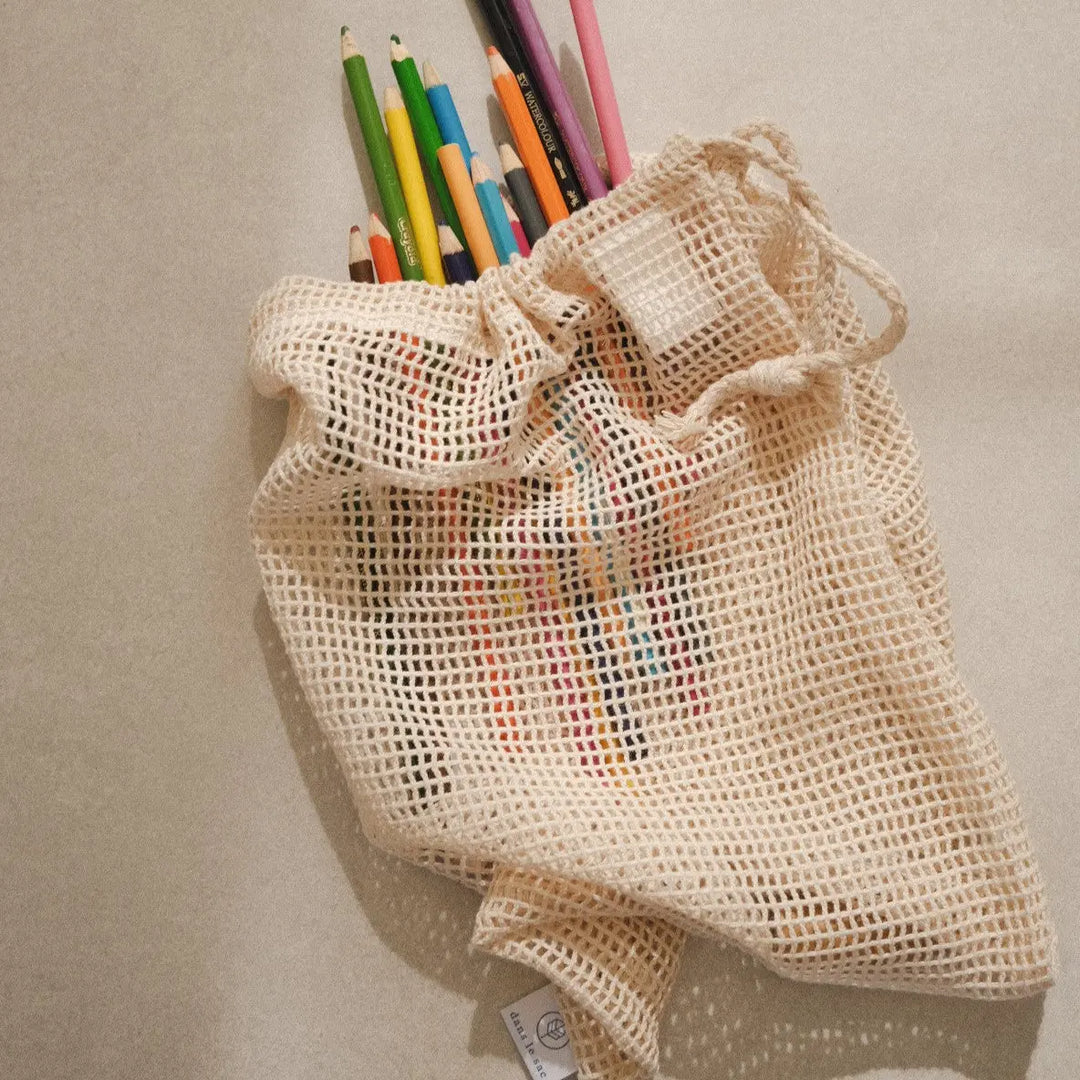 Sac en filet de coton avec des crayons