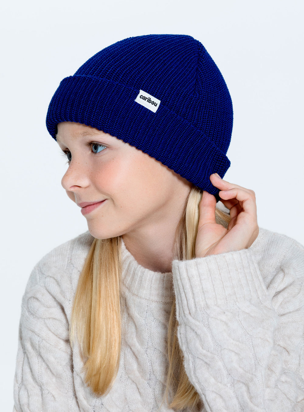 Fille avec Tuque pêcheur tricoté en laine mérinos Indigo