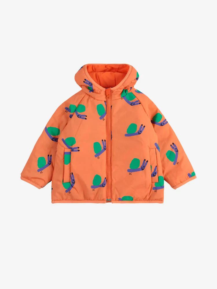Veste réversible pour bébé en 100% Polyamide recyclé orange avec imprimé escargots 