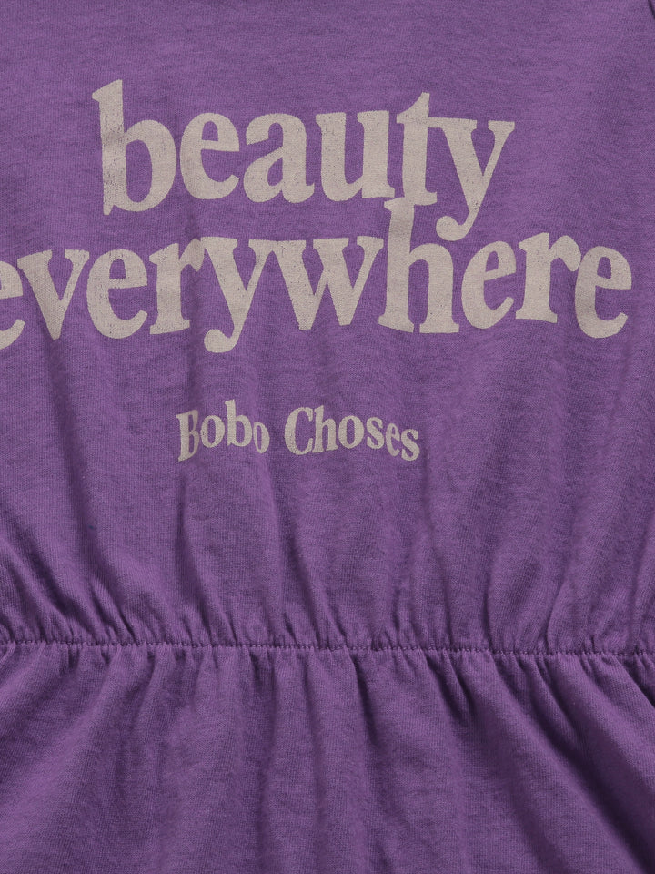 bobo choses purple playsuit with ''beauty everywhere'' print, close-up